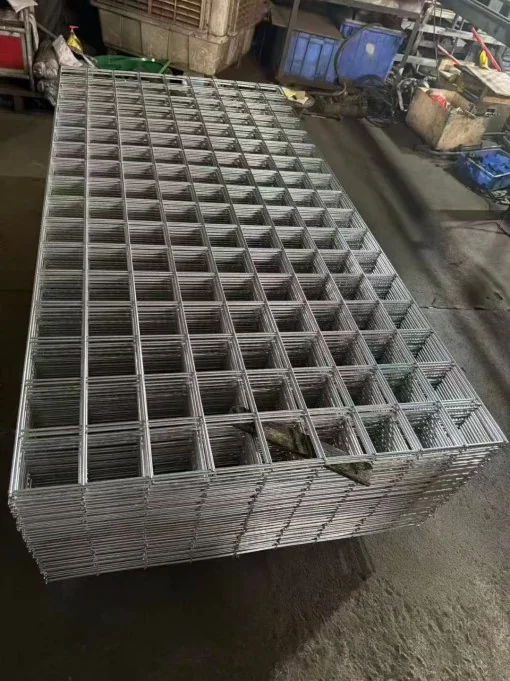 Welded reinforcing mesh panels stacked in the workshop