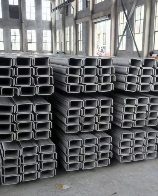 Structural steel channel sections stacked for dispatch